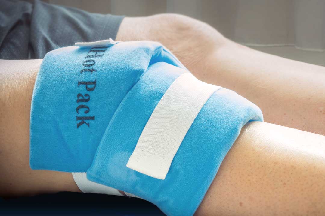 Hot Pack treatment on injured knee