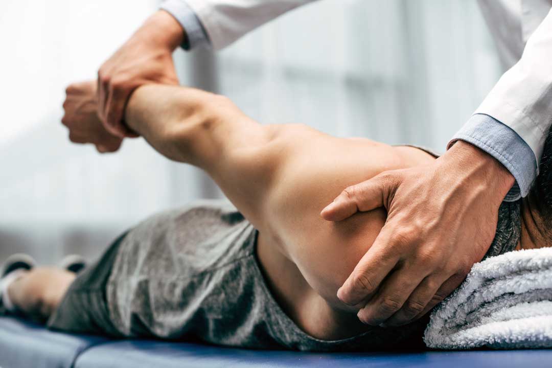 Chiropractor treats sports injury